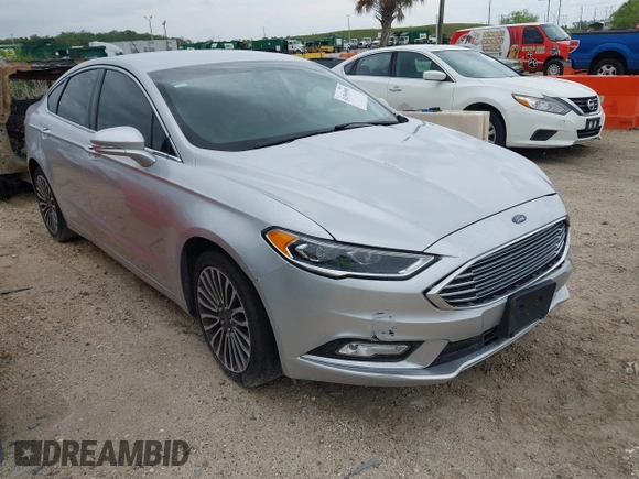 2017 Ford Fusion SE z VIN 3FA6P0HD5HR166433, wystawiony jako IAAI lot #42394998 z przebiegiem 121 333 mil mil oraz . Historia ofert i sprzedaży dostępna na DreamBid. Obrazek 1.