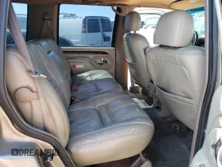 2000 Cadillac Escalade z VIN 1GYEK63R5YR187895, wystawiony jako Copart lot #72468044 z przebiegiem 189 026 mil mil oraz Tytuł czysty. Historia ofert i sprzedaży dostępna na DreamBid. Obrazek 10.
