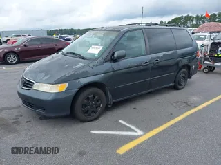 2003 Honda Odyssey EX-L with VIN 5FNRL18963B059910, listed as a IAAI auction lot 42415037 with 267,600 mi miles and . Bid and sale history available at DreamBid. Image 2.