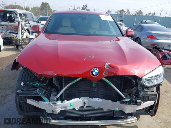 2021 BMW X4 xDrive30i with VIN 5UX2V1C09M9F29509, listed as a IAAI auction lot 42408605 with 46,992 mi miles and . Bid and sale history available at DreamBid. Image 13.