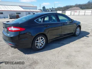 2014 Ford Fusion SE with VIN 1FA6P0HDXE5370384, listed as a IAAI auction lot 41973412 with 147,459 mi miles and . Bid and sale history available at DreamBid. Image 4.
