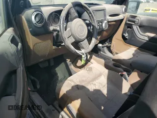 2012 Jeep Wrangler Sahara z VIN 1C4AJWBG1CL216425, wystawiony jako Copart lot #48377825 z przebiegiem 99 649 mil mil oraz Szkoda całkowita • Salvage title. Historia ofert i sprzedaży dostępna na DreamBid. Obrazek 8.
