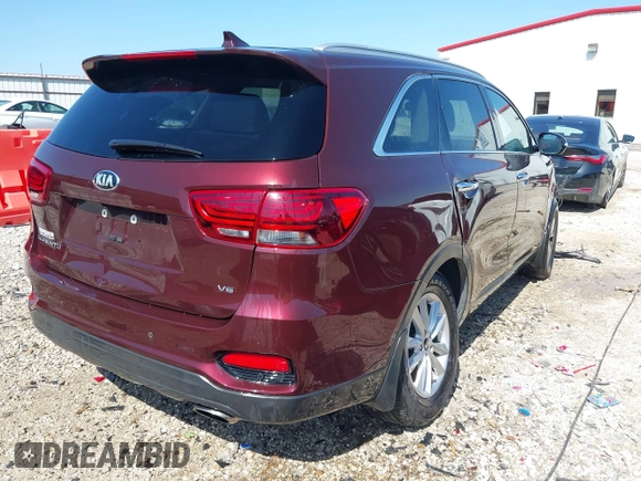 2019 Kia Sorento LX z VIN 5XYPG4A53KG442330, wystawiony jako IAAI lot #41979033 z przebiegiem 95 335 mil mil oraz . Historia ofert i sprzedaży dostępna na DreamBid. Obrazek 4.