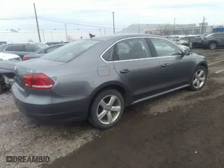 2014 Volkswagen Passat SE w/Sunroof with VIN 1VWBT7A34EC058651, listed as a IAAI auction lot 41674952 with 117,932 mi miles. Bid and sale history available at carsss.com. Image 4.