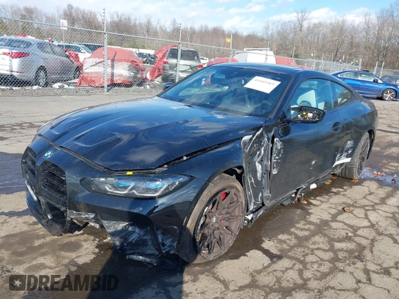 2024 BMW M4 Competition xDrive with VIN WBS43AZ09RCS01210, listed as a IAAI auction lot 41445369 with 8,897 mi miles. Bid and sale history available at carsss.com. Image 2.