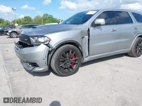2018 Dodge Durango SRT with VIN 1C4SDJGJ6JC366644, listed as a IAAI auction lot 41906182 with 54,490 mi miles and . Bid and sale history available at DreamBid. Image 17.