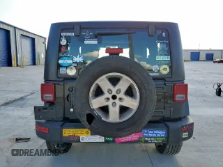 2015 Jeep Wrangler Freedom Edition with VIN 1C4AJWAG8FL541675, listed as a Copart auction lot 62647855 with 53,915 mi miles and Salvage title. Bid and sale history available at DreamBid. Image 6.