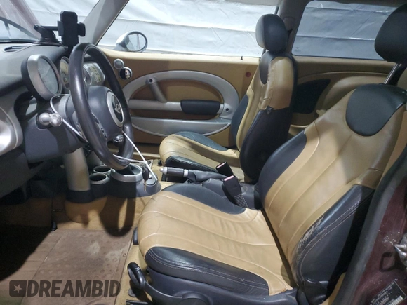 2002 MINI Hardtop with VIN WMWRC33402TC36986, listed as a Copart auction lot 50131045 with 194,224 mi miles and Salvage Title. Bid and sale history available at DreamBid. Image 7.