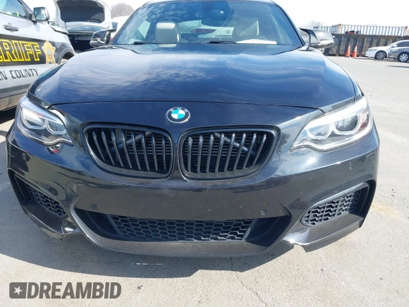 2015 BMW 2 Series M235i with VIN WBA1J7C55FV358964, listed as a IAAI auction lot 41674800 with 63,504 mi miles and . Bid and sale history available at carsss.com. Image 12.