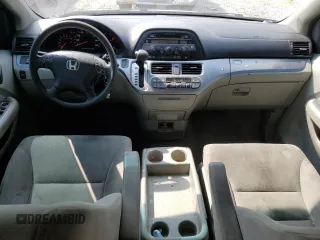 2010 Honda Odyssey EX with VIN 5FNRL3H48AB086975, listed as a Copart auction lot 60258265 with 184,344 mi miles and Salvage title. Bid and sale history available at DreamBid. Image 8.