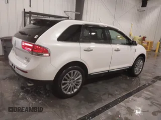 2011 Lincoln MKX with VIN 2LMDJ8JK8BBJ34012, listed as a IAAI auction lot 41524792 with 142,670 mi miles. Bid and sale history available at carsss.com. Image 4.