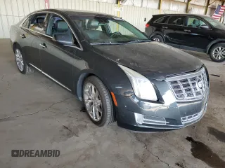 2014 Cadillac XTS Luxury with VIN 2G61M5S36E9268127, listed as a Copart auction lot 53975755 with 138,653 mi miles and Salvage Title. Bid and sale history available at DreamBid. Image 4.
