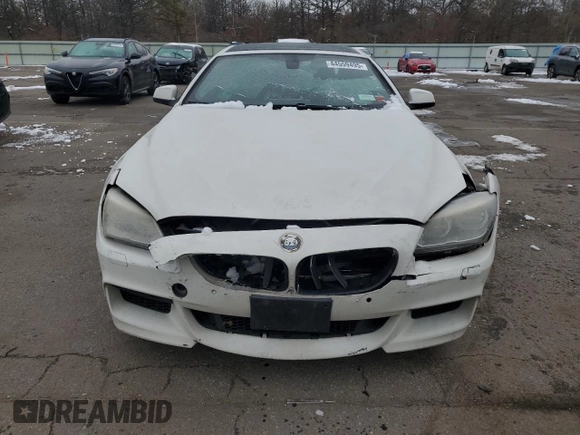2015 BMW 6 Series 640i xDrive z VIN WBA6B8C55FD452972, wystawiony jako Copart lot #44559495 z przebiegiem 114 358 mil mil oraz Szkoda całkowita • Salvage title. Historia ofert i sprzedaży dostępna na DreamBid. Obrazek 5.