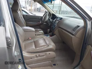 2004 Acura MDX Touring Pkg RES w/Nav with VIN 2HNYD18944H529592, listed as a IAAI auction lot 41922111 with 273,869 mi miles. Bid and sale history available at carsss.com. Image 5.