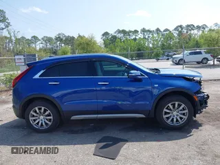 2023 Cadillac XT4 FWD Premium Luxury with VIN 1GYFZCR43PF104796, listed as a IAAI auction lot 41931695 with 12,666 mi miles. Bid and sale history available at carsss.com. Image 13.
