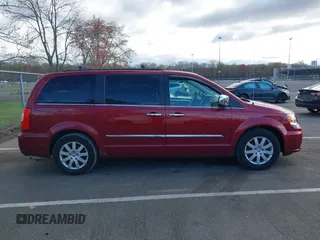 2012 Chrysler Town & Country Touring-L with VIN 2C4RC1CG3CR413148, listed as a IAAI auction lot 42040272 with 137,631 mi miles. Bid and sale history available at carsss.com. Image 13.
