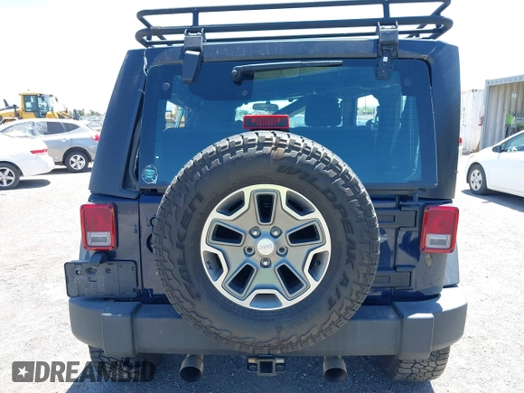 2013 Jeep Wrangler Sport with VIN 1C4AJWAG3DL627179, listed as a IAAI auction lot 42262246 with 33,536 mi miles and . Bid and sale history available at DreamBid. Image 16.