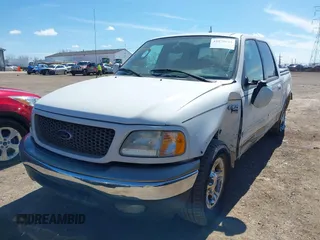 2003 Ford F-150 XLT with VIN 1FTRW07663KD57580, listed as a IAAI auction lot 41870643 with 256,497 mi miles. Bid and sale history available at carsss.com. Image 17.