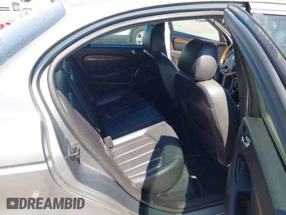 2004 Jaguar X-Type with VIN SAJEA51C04WD73023, listed as a IAAI auction lot 41874488 with 199,333 mi miles and . Bid and sale history available at DreamBid. Image 8.