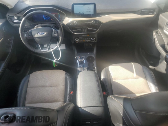 2021 Ford Escape Titanium Hybrid z VIN 1FMCU9DZ9MUA18764, wystawiony jako Copart lot #78848764 z przebiegiem 89 499 mil mil oraz Nie do naprawy • Non repairable. Historia ofert i sprzedaży dostępna na DreamBid. Obrazek 8.