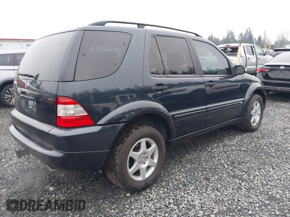 2002 Mercedes-Benz M 320/430/500 z VIN 4JGAB54E72A296354, wystawiony jako IAAI lot #41277897 z przebiegiem 101 842 mil mil oraz . Historia ofert i sprzedaży dostępna na DreamBid. Obrazek 4.