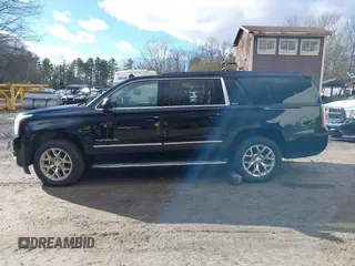 2015 GMC Yukon XL SLT with VIN 1GKS2HKC9FR159164, listed as a IAAI auction lot 41235420 with 136,730 mi miles. Bid and sale history available at carsss.com. Image 14.