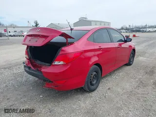 2015 Hyundai Accent GLS with VIN KMHCT4AE6FU851075, listed as a IAAI auction lot 41868391 with 90,523 mi miles. Bid and sale history available at carsss.com. Image 4.