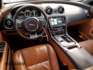 2015 Jaguar XJ with VIN SAJWA2GT2FMV90837, listed as a Copart auction lot 71126294 with 92,973 mi miles and Clean Title. Bid and sale history available at DreamBid. Image 8.