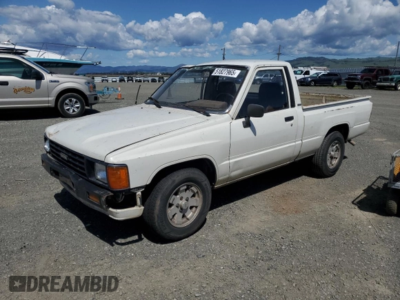 1985 Toyota Pickup z VIN JT4RN50R4F0068265, wystawiony jako Copart lot #51827965 z przebiegiem 348 047 mil mil oraz Szkoda całkowita • Salvage title. Historia ofert i sprzedaży dostępna na DreamBid. Obrazek 1.