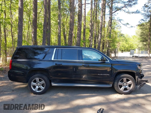 2015 Chevrolet Suburban LT with VIN 1GNSCJKC1FR264255, listed as a IAAI auction lot 42065176 with 115,861 mi miles. Bid and sale history available at carsss.com. Image 13.