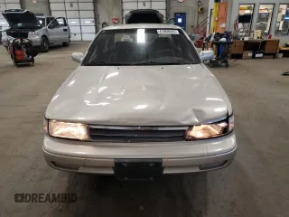 1990 Nissan Maxima z VIN JN1HJ01PXLT401797, wystawiony jako Copart lot #47868945 z przebiegiem Nie podano mil oraz Szkody całkowita. Historia ofert i sprzedaży dostępna na DreamBid. Obrazek 5.