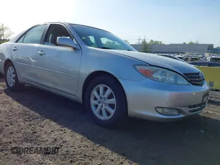 2003 Toyota Camry LE with VIN 4T1BE30K43U227357, listed as a IAAI auction lot 42144237 with 101,135 mi miles and . Bid and sale history available at DreamBid. Image 1.