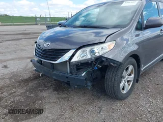 2012 Toyota Sienna LE AAS with VIN 5TDKK3DC5CS270481, listed as a IAAI auction lot 42093687 with 208,899 mi miles. Bid and sale history available at carsss.com. Image 6.