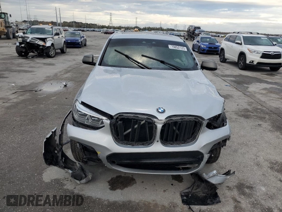 2021 BMW X4 M40i with VIN 5UX2V5C07M9G03839, listed as a Copart auction lot 79852123 with 0 mi miles. Bid and sale history available at carsss.com. Image 5.