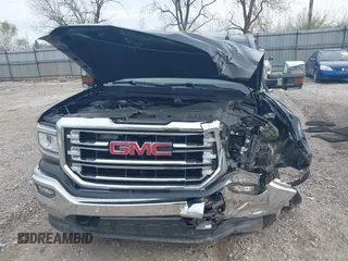 2017 GMC Sierra 1500 SLT z VIN 1GTV2NEC7HZ111863, wystawiony jako IAAI lot #41941394 z przebiegiem 66 964 mil mil oraz . Historia ofert i sprzedaży dostępna na DreamBid. Obrazek 12.