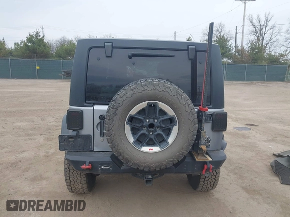 2015 Jeep Wrangler Unlimited Rubicon with VIN 1C4BJWFG1FL546018, listed as a IAAI auction lot 42060045 with 107,249 mi miles and . Bid and sale history available at DreamBid. Image 17.