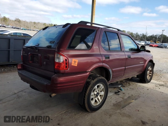 2002 Isuzu Rodeo S z VIN 4S2CK58W924328997, wystawiony jako Copart lot #41454525 z przebiegiem 110 569 mil mil oraz Szkoda całkowita • Salvage title. Historia ofert i sprzedaży dostępna na DreamBid. Obrazek 3.