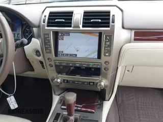 2014 Lexus GX with VIN JTJBM7FX0E5069997, listed as a IAAI auction lot 42076860 with 122,800 mi miles. Bid and sale history available at carsss.com. Image 21.