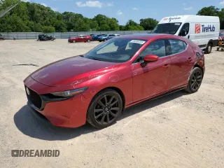 2021 Mazda 3 Premium with VIN JM1BPAML4M1317178, listed as a Copart auction lot 56008305 with 104,380 mi miles and Salvage title. Bid and sale history available at DreamBid. Image 1.