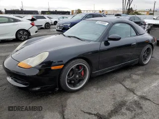 1999 Porsche 911 with VIN WP0CA2999XS650760, listed as a Copart auction lot 45106985 with 70,877 mi miles and Clean Title. Bid and sale history available at DreamBid. Image 1.