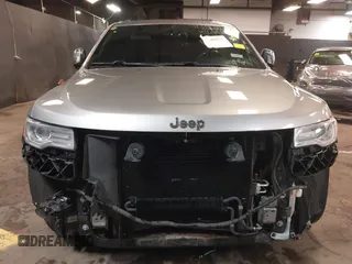 2015 Jeep Grand Cherokee Overland with VIN 1C4RJFCG1FC215426, listed as a IAAI auction lot 41689821 with 128,563 mi miles. Bid and sale history available at carsss.com. Image 13.