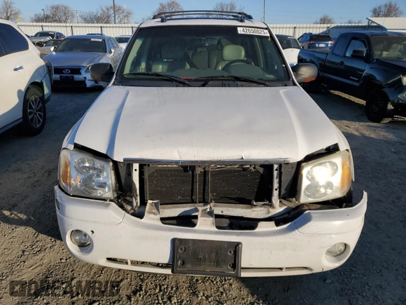 2005 GMC Envoy SLE с VIN 1GKDS13S852261326, выставлен на аукционе Copart как лот 42650025 с пробегом 210 485 миль миль и Списание • Salvage title. История ставок и продаж доступна на DreamBid. Изображение 5.