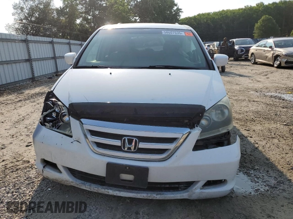 2007 Honda Odyssey EX с VIN 5FNRL38497B034764, выставлен на аукционе Copart как лот 58607635 с пробегом 77 028 миль миль и Чистый • Clean title. История ставок и продаж доступна на DreamBid. Изображение 6.
