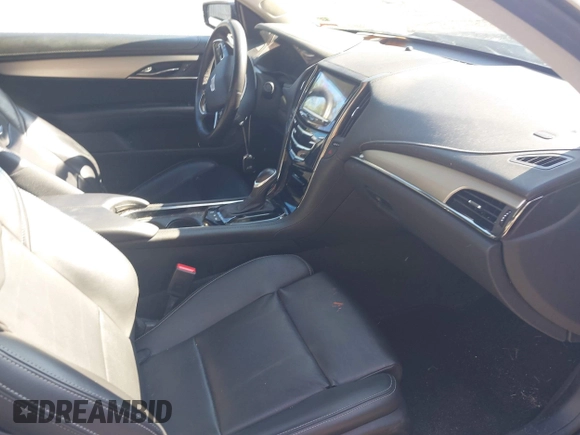 2016 Cadillac ATS Luxury Collection RWD z VIN 1G6AB1RX9G0194349, wystawiony jako IAAI lot #41882442 z przebiegiem 52 676 mil mil oraz . Historia ofert i sprzedaży dostępna na DreamBid. Obrazek 5.