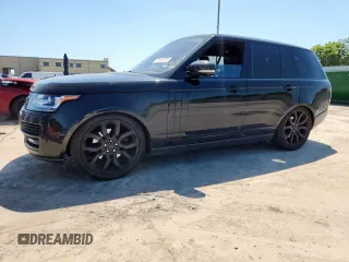 2014 Land Rover Range Rover HSE with VIN SALGS2WF1EA182740, listed as a Copart auction lot 61433785 with 153,874 mi miles and Salvage title. Bid and sale history available at DreamBid. Image 1.
