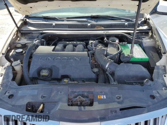 2009 Lincoln MKS with VIN 1LNHM94R79G620820, listed as a Copart auction lot 49594165 with 166,163 mi miles and Salvage Title. Bid and sale history available at DreamBid. Image 12.