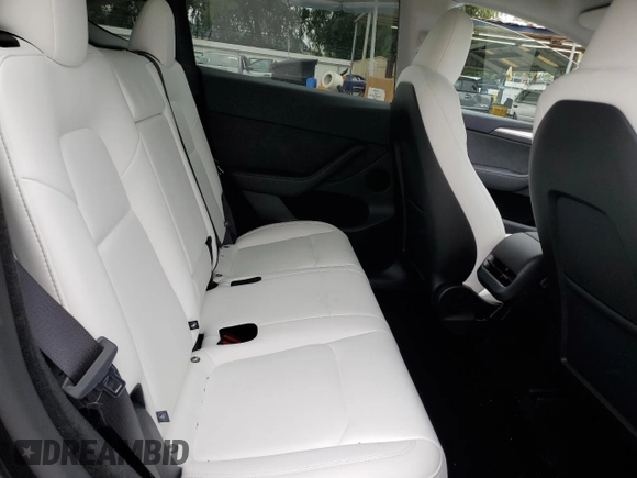 2025 Tesla Model Y Long Range with VIN 7SAYGDED8SF277469, listed as a Copart auction lot 45600195 with 442 mi miles and Salvage Title. Bid and sale history available at DreamBid. Image 10.