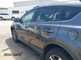 2018 Toyota RAV4 XLE with VIN JTMWFREV9JJ201845, listed as a IAAI auction lot 42442303 with 111,177 mi miles and . Bid and sale history available at DreamBid. Image 14.
