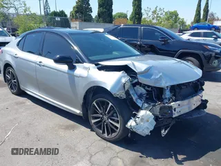 2020 Toyota Camry XSE with VIN 4T1K61AK5LU381320, listed as a IAAI auction lot 42248955 with 86,534 mi miles and . Bid and sale history available at DreamBid. Image 1.