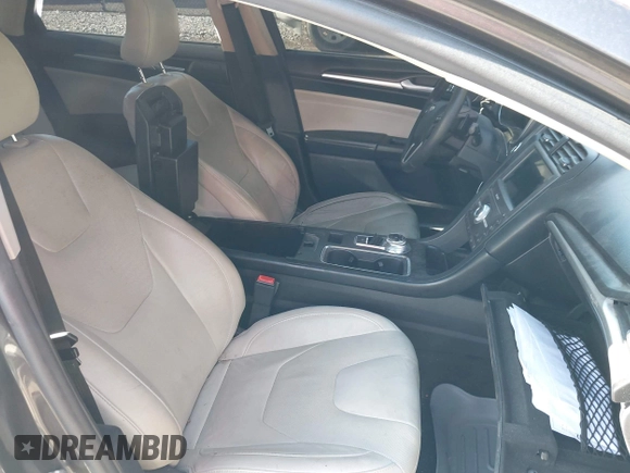 2017 Ford Fusion Titanium with VIN 3FA6P0K98HR124035, listed as a IAAI auction lot 42307936 with Not provided miles and . Bid and sale history available at DreamBid. Image 5.